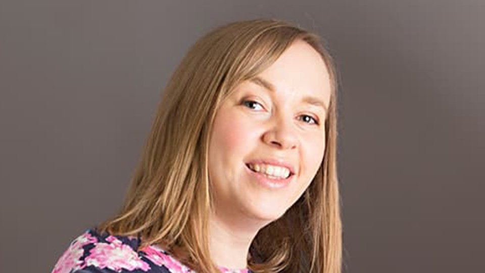 Ella next to grey background